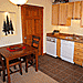 Glacier Ridge Suites - condo rentals - Spacious suites feature down comforters on luxurious king beds & gourmet kitchens. The Glacier artwork, leather furniture, warm wood, tile & granite have guests saying 'WOW'!