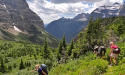 Backpacking over Brown's Pass in Glacier National Park Montana with Glacier Guides. Photo by Tania M. Backpacking over Brown's Pass in Glacier National Park Montana with Glacier Guides. Photo by Tania M.