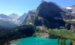 Hiking up to Grinnell Glacier in Glacier National Park with Glacier Guides. Hiking up to Grinnell Glacier in Glacier National Park with Glacier Guides.